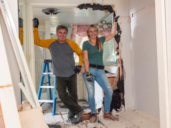 Brady Bunch actor Christopher Knight / Peter Brady and HGTV's Jasmine Roth pause after an intense demo in the upstair master bathroom of the original Brady House in Studio City, CA, as seen on A Very Brady Renovation. (portrait)