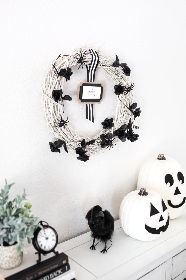 With a few basic supplies from the craft store, you can easily assemble this white grapevine wreath to dress up your home for Halloween. Simply change out the embellishments and it transitions beautifully to fall. Download our free printable labels and attach to a mini chalkboard or sign for the perfect finishing touch.
