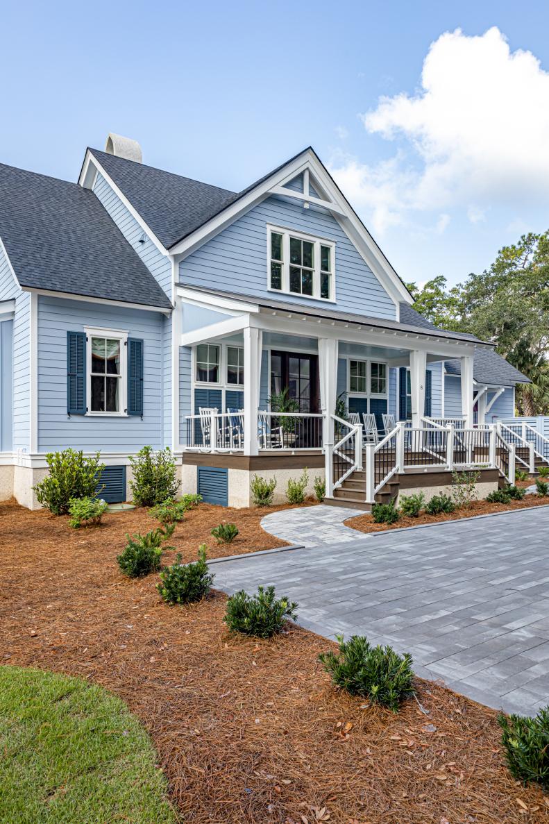 Blue Coastal Home Has Bright White Trim and Accents