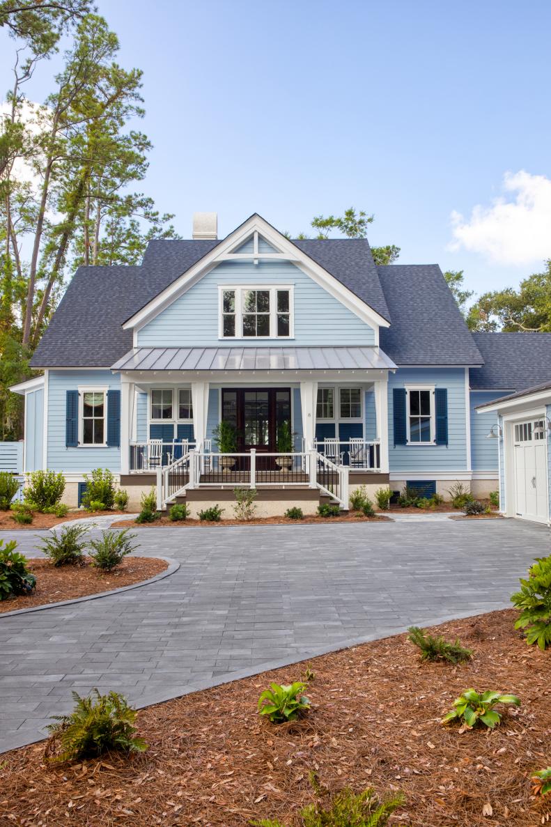 Blue Coastal-Style House Has Stone-Paver Driveway