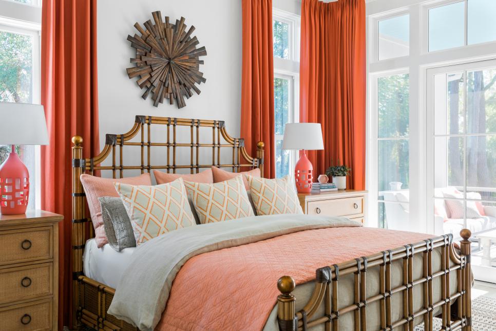 White Coastal-Style Master Bedroom With Coral-Colored Accents