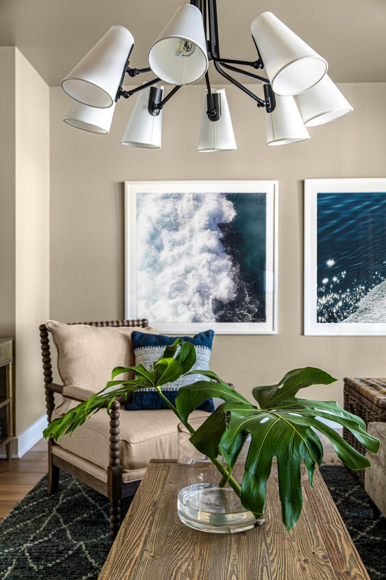 Eye-Catching Framed Art Adds Pop of Blue to Neutral Living Room