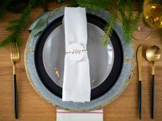 Christmas Tablescape With Dough Napkin Ring Holder That Says Joy