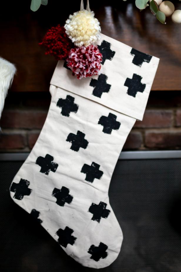 See how to embellish a plain, canvas Christmas stocking on HGTV.com. 