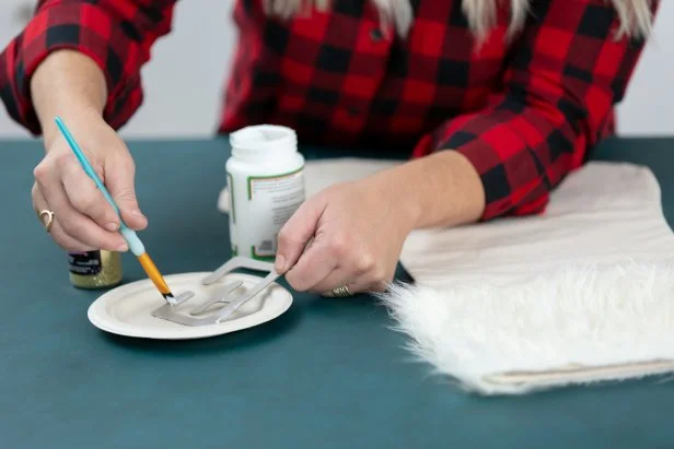 Upgrade a plain, canvas stocking from the craft store with white faux fur and a glittery initial.