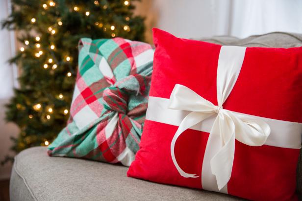 Throw pillows wrapped like Christmas gifts