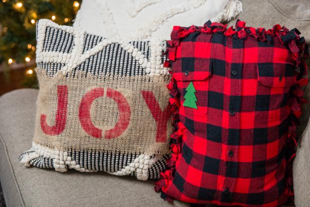 Two Festive Holiday Throw Pillows On a Couch