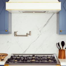 White Stove With Gold Hardware