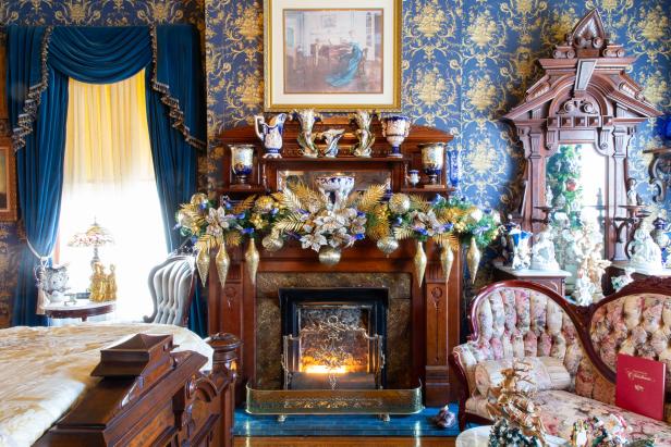 Homeowner David Brown's holiday home features a heavily decorated master bedroom, as seen on Outrageous Holiday Houses.