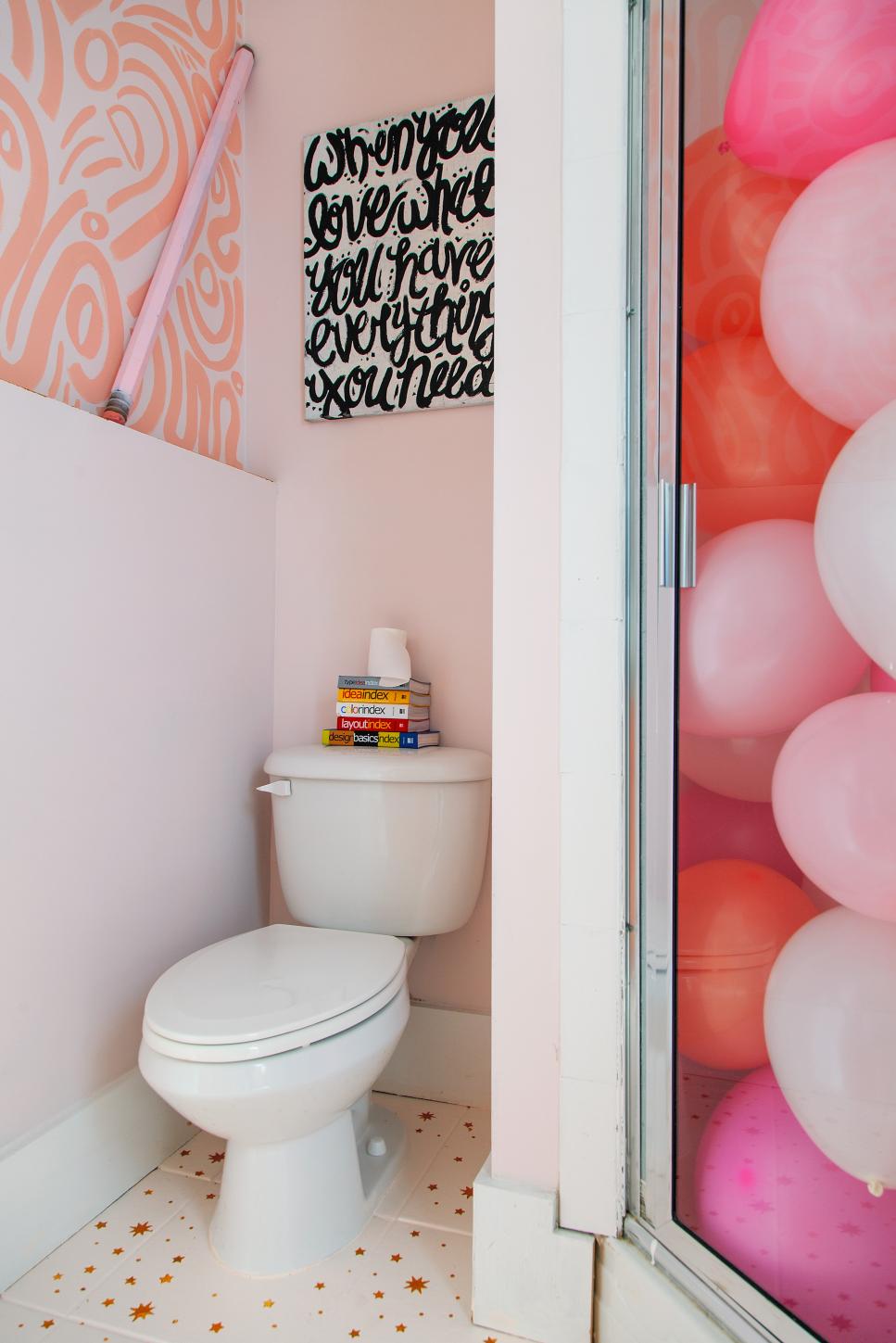 Light Pink Bathroom Is Filled With Multiple Patterns and