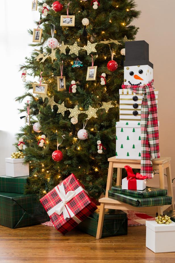 A Stack of Gifts Resembling a Snowman With a Hat