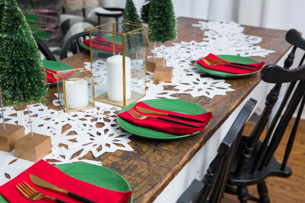 A Paper Snowflake Table Runner With Christmas Decor