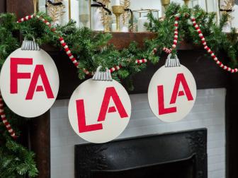 Three Ornaments Spelling Out "Fa-La-La" On a Garland