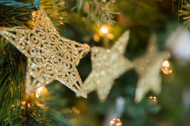 Gold Star Garland Draped Around a Christmas Tree