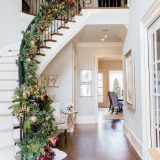 Staircase With Green and Gold Garland
