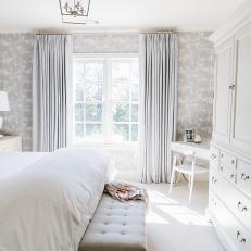 Bright Guest Bedroom With Neutral Armoire 