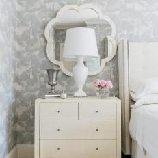 Neutral Dresser With Modern White Lamp