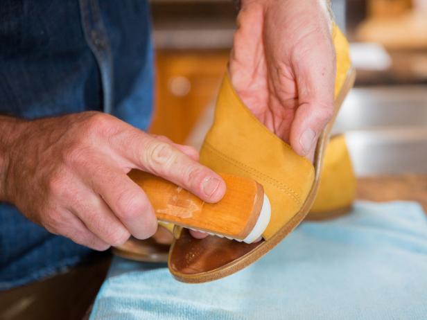 Once you’ve removed the stain with the suede brush, you can restore the suede nap by using a rubber crepe brush. The rubber will lift the fibers of the suede and restore it to its original look. Use the crepe brush in one direction only, brushing until you reach a uniform look to the suede.