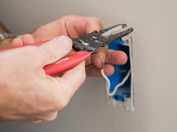Each wire should have a half inch of wire exposed and bent into a U shape that will fit snugly around the screws on the switch. Your electrician’s pliers have a nifty feature made specifically for this purpose.