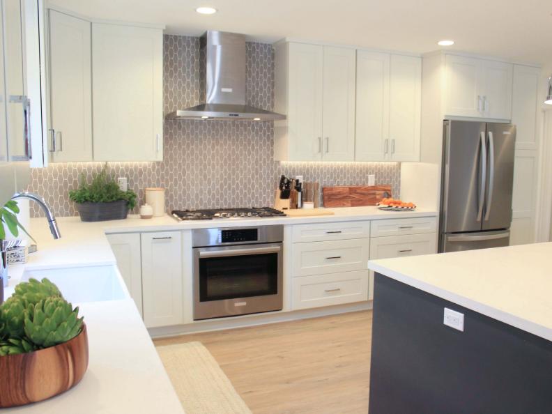 Light, bright, and stunning countertops sit upon brand new shaker cabinets and feature chrome and stainless steel accents at this Fountain Valley, CA kitchen, as seen on HGTV's Christina on the Coast.