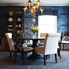 Blue Traditional Dining Room With Gold Chandelier