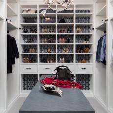 Gray and White Walk In Closet With Shoe Shelf