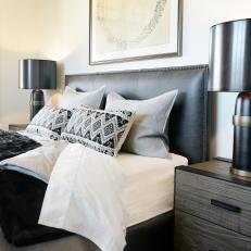 Rustic Guest Room With Leather Headboard