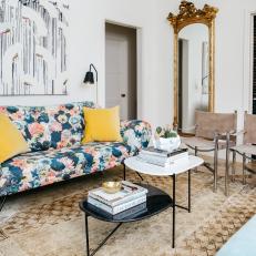 Eclectic Living Room Features Floral Sofa, Sunny Yellow Pillows