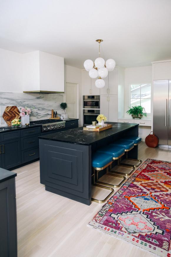 contemporary kitchen with navy blue island