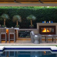 Covered Lounge and Bar With Fireplace
