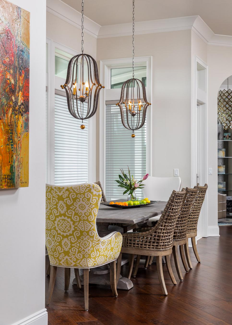 Dining Alcove With Artistic Chandeliers, Colorful Dining Chairs | HGTV