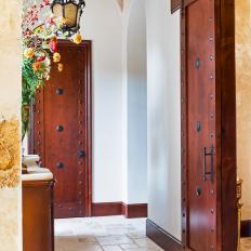 Mediterranean Hall With Wood Doors