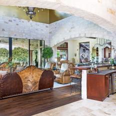 Mediterranean Living Room With Stone Wall