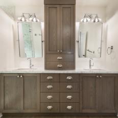 Neutral Bathroom With Silver Sconces