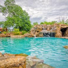 Backyard With Pool and Waterfall