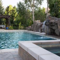 Swimming Pool With Hot Tub And Boulder Water Feature