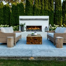 Patio Sitting Area With White Fireplace