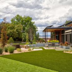 Modern Home Backyard With Synthetic Turf