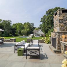 Extensive Patio With Grand Stone Fireplace 