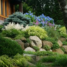 Rock Garden With Blue Hydrangeas