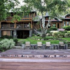 Dock and Stone Patio With Chairs