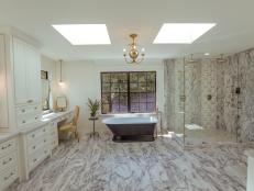 This bahtroom has been dubbed the bank bathroom for the old bank like finishes.