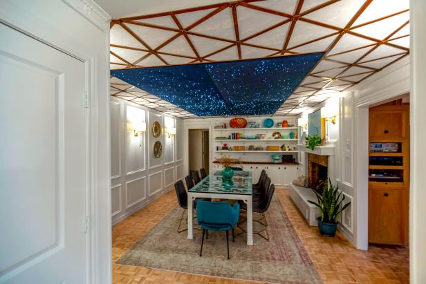Post renovation photo of the Flores dining room showcasing the star ceiling and rock table.