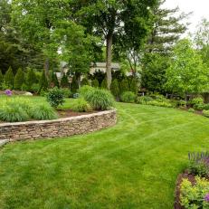 Lawns and Stone Retaining Wall