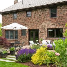 Brick Tudor Exterior and Backyard