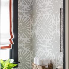 Powder Room With Patterned Wallpaper