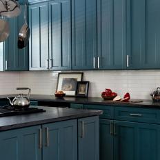 Blue Open Plan Kitchen With Pot Rack