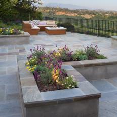 Raised Beds With Perennials on Bluestone Terrace With Fire Pit