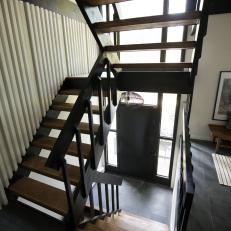 Modern Black Stairway with Black Railing 