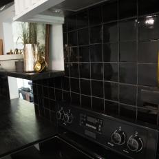 Modern Black Kitchen with Black Butcher Block Countertops 